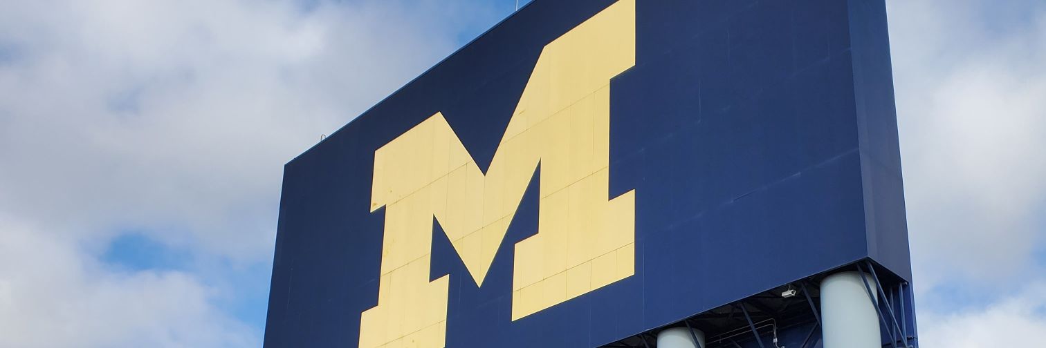 M banner