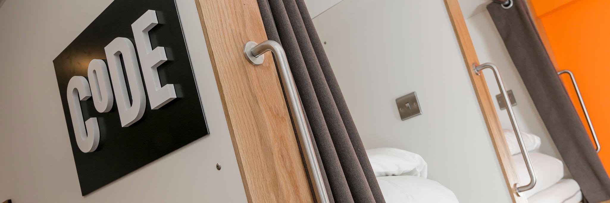 CoDE Pod Hostels banner
