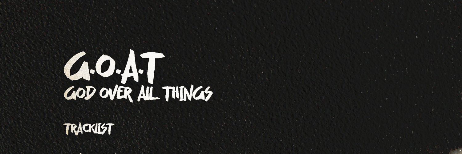 G.O.A.T banner