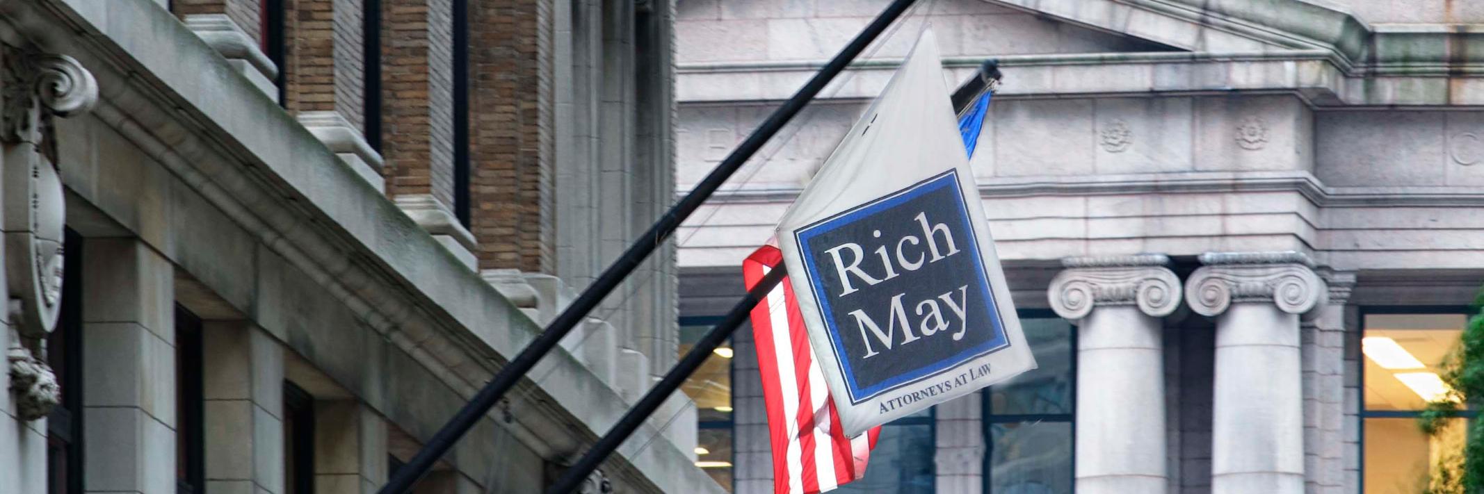 Rich May, P.C. banner