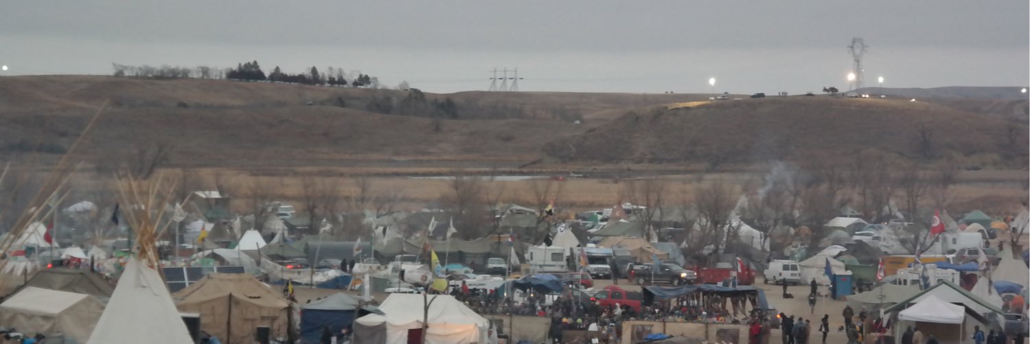 Michael Running Wolf banner