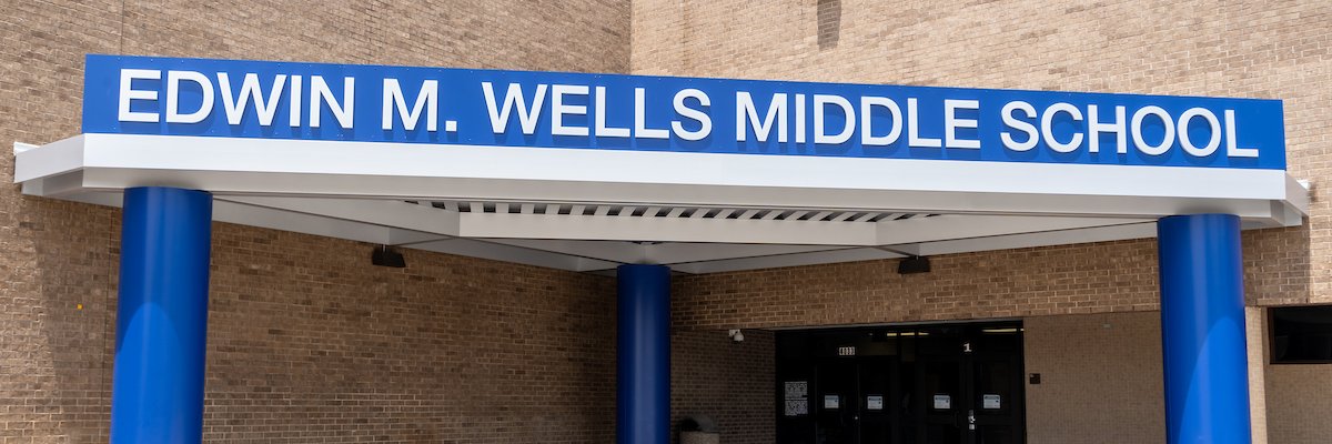 Edwin M. Wells Middle School's banner