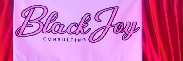 A'Esha Goins “Coach” banner