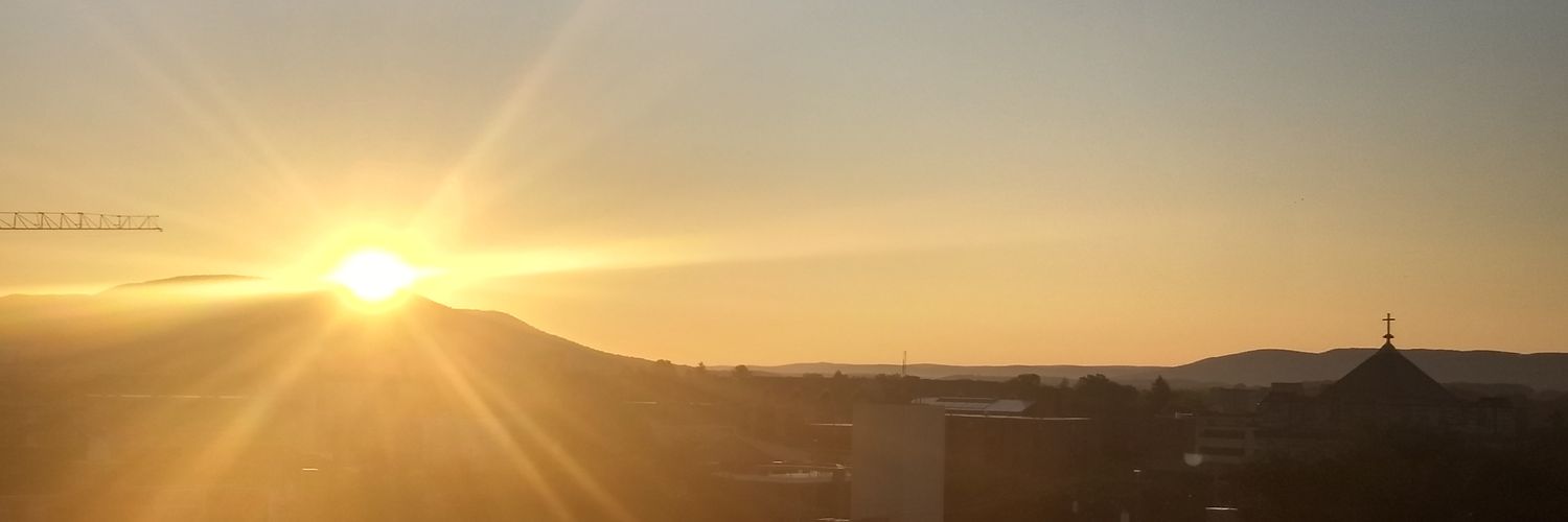 John E. Price banner