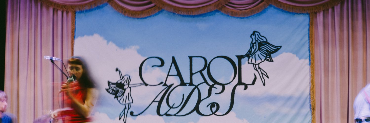 carol ades banner