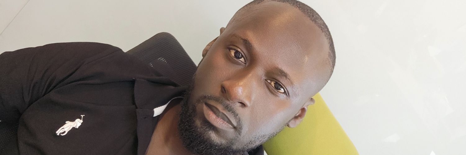 Okello Emmanuel Gad Jr banner