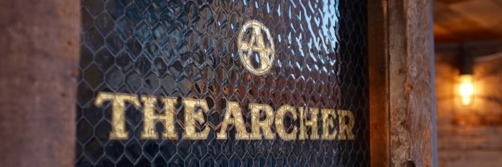 The Archer banner