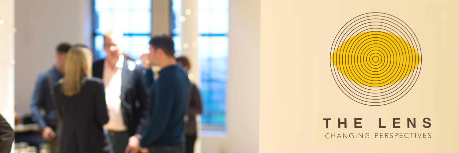 The Lens banner