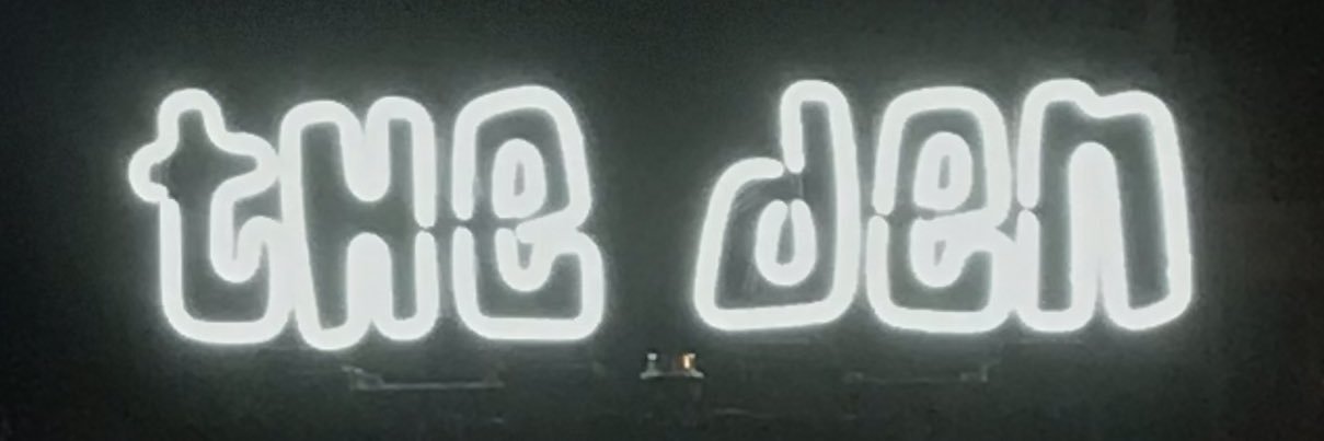 The Den banner