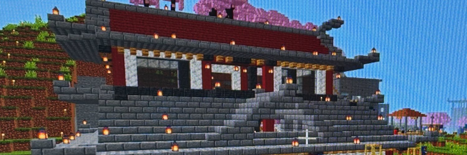 ぼーっと招き猫そんくん。🐱💜🐷🐍 banner