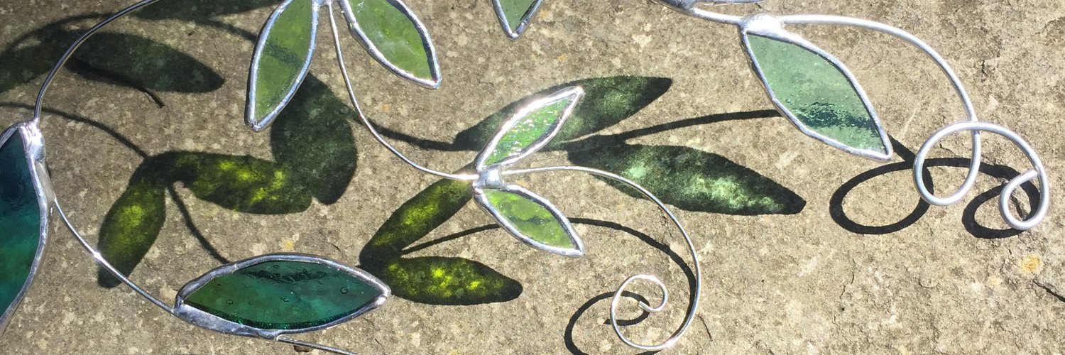 root studio stained glass banner