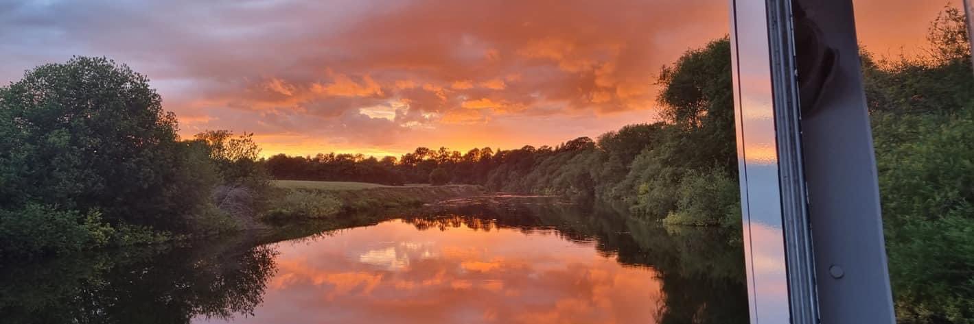 Isla 🧡💜🤍💚🧡 banner