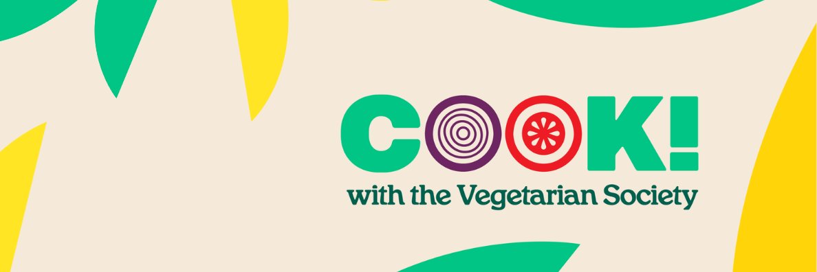 COOK! with the Vegetarian Society's banner