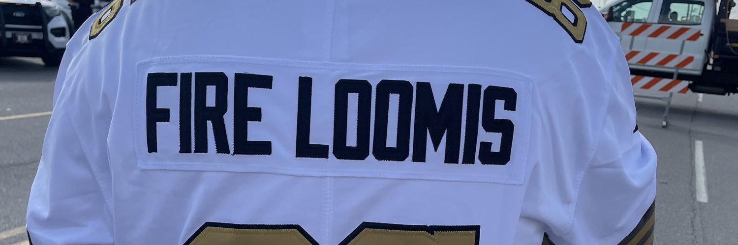 FIRE MICKEY LOOMIS banner