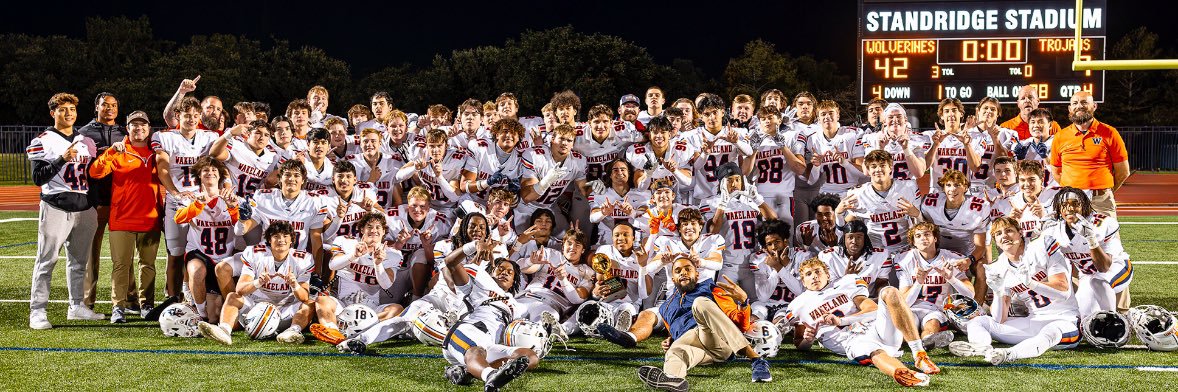 Wakeland Wolverine Football's banner