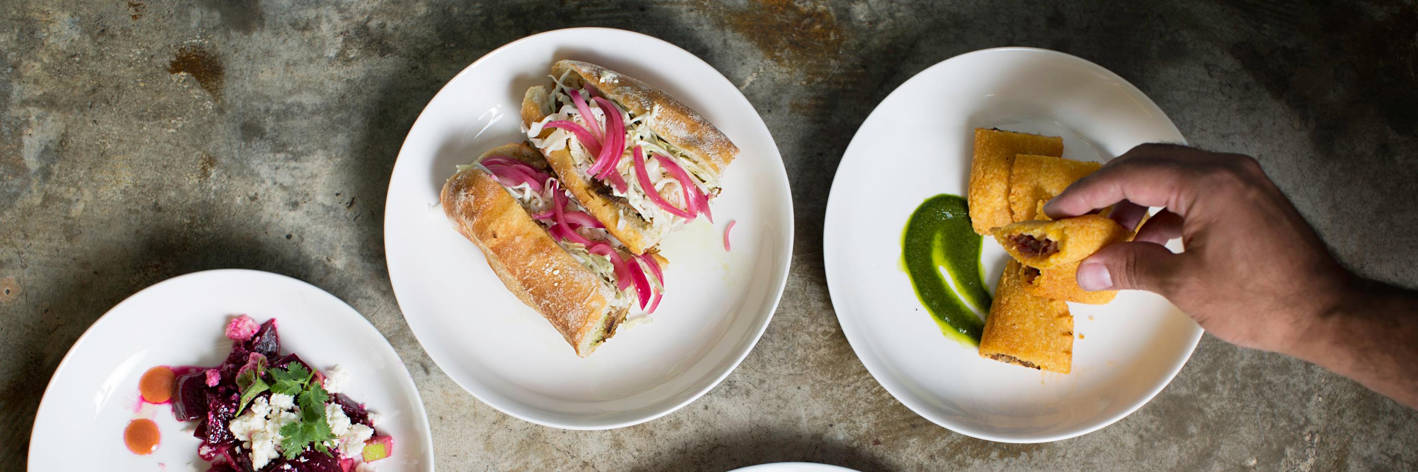 Manu's Bodega banner