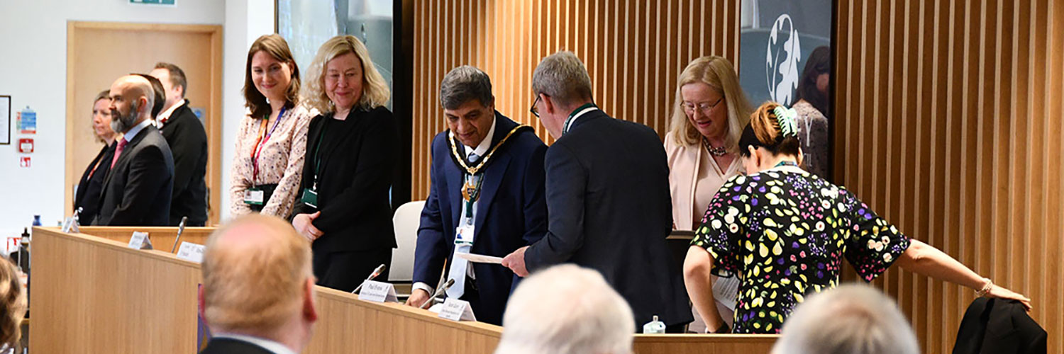 Saj Hussain - Chair of Surrey County Council banner