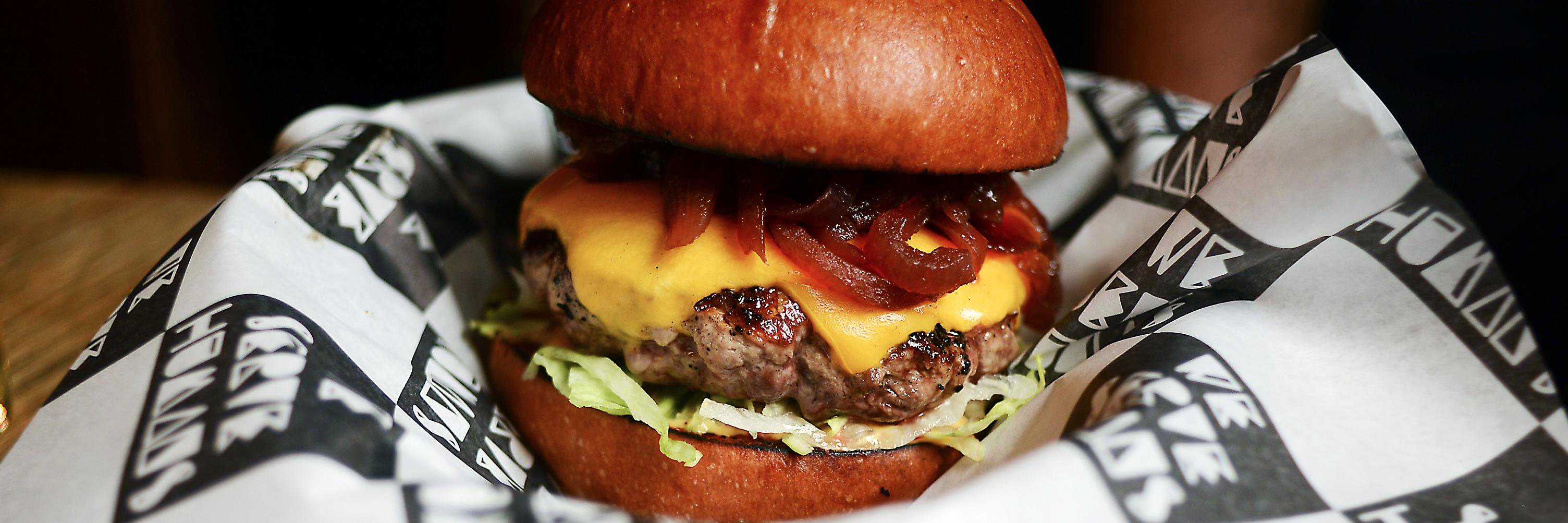 We Serve Humans banner