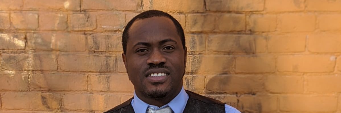 Titus Olukitibi banner