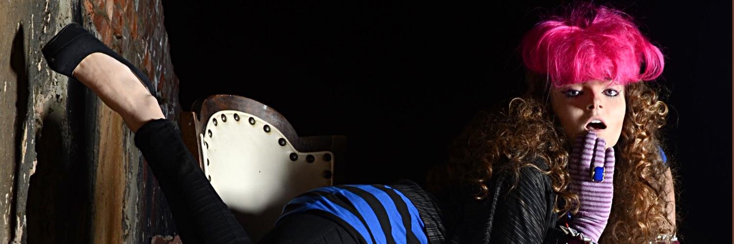 DesignsByDinoma's profile banner image