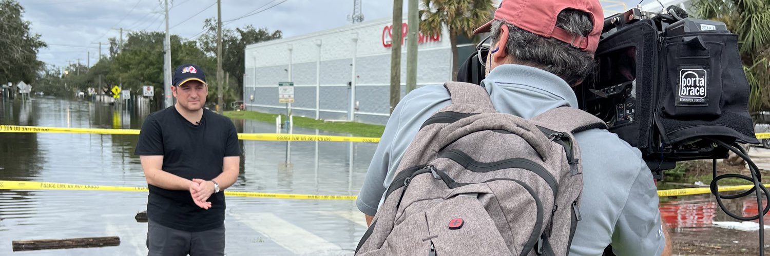 Justin Schecker banner