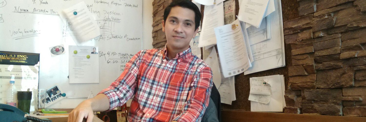 rexiedalisay's profile banner image