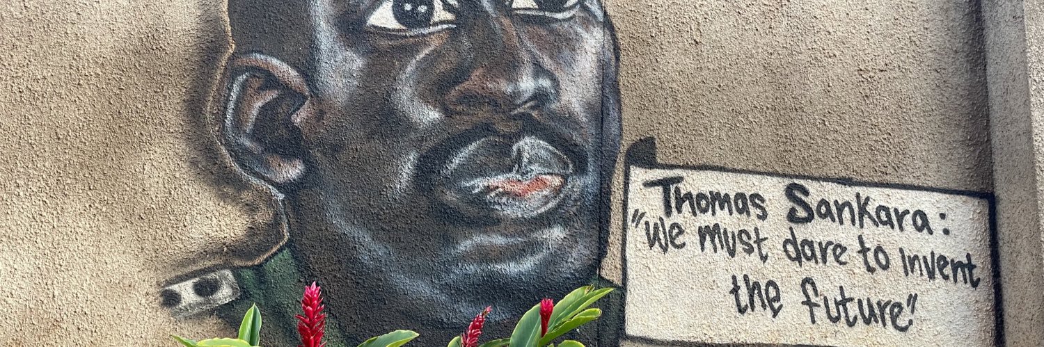 Ivan Okuda, FCIArb banner