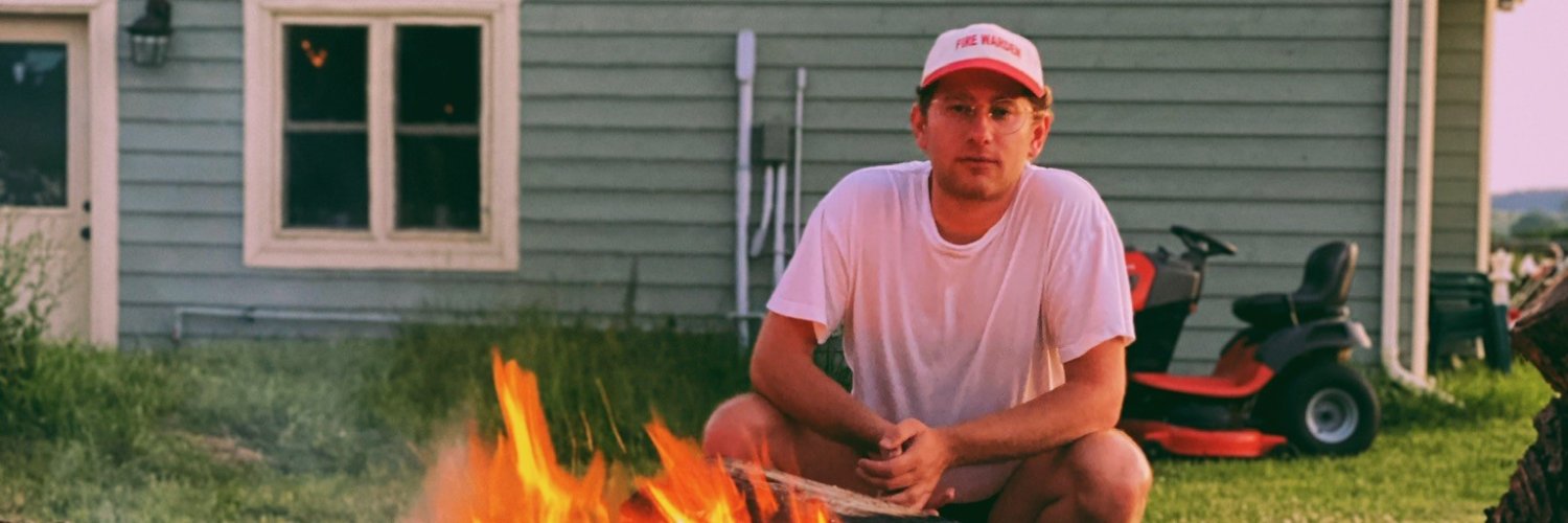 pulling on a revolving door to open it for a lady banner