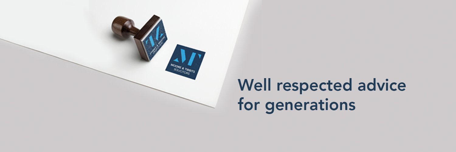 Moore and Tibbits banner