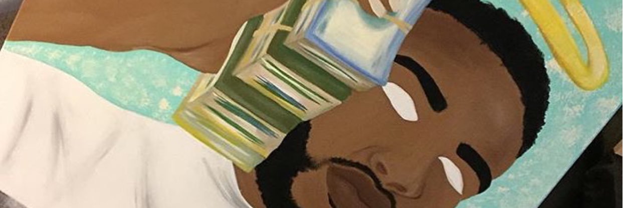 K'$.'s banner