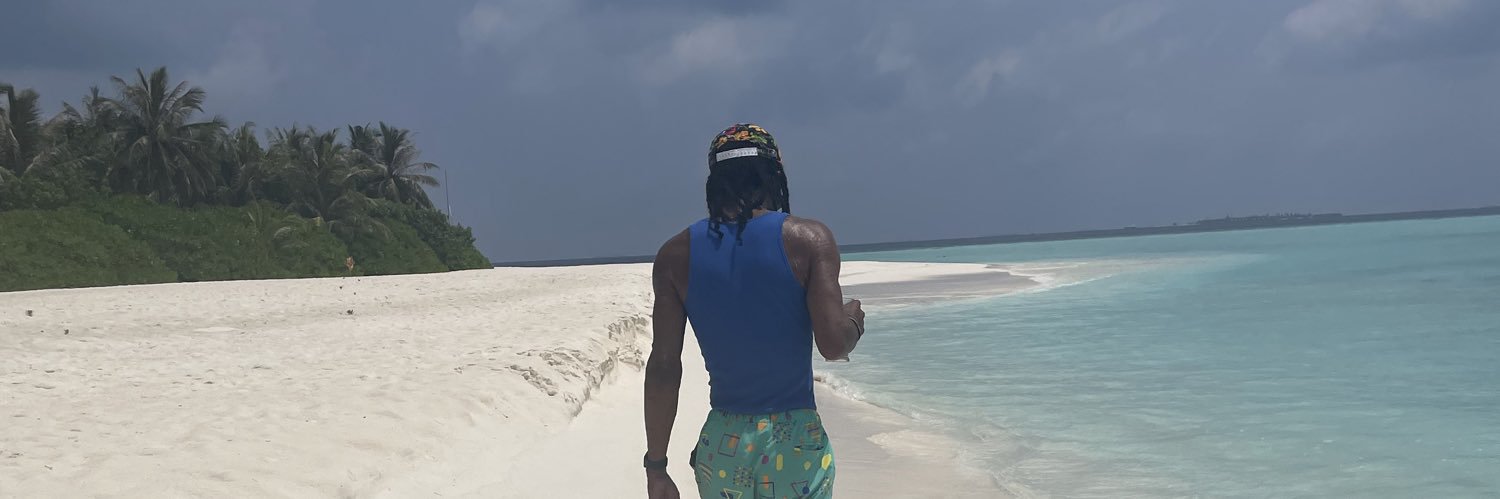 Optimistic Realist 🤴🏽 banner