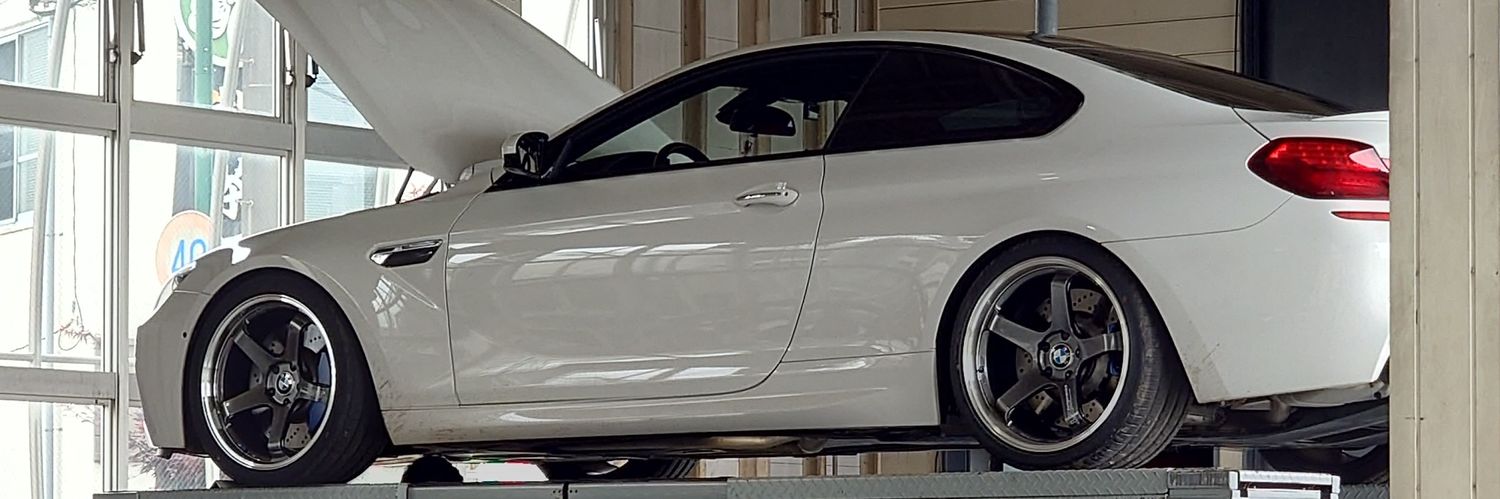 R．Tsuboi banner