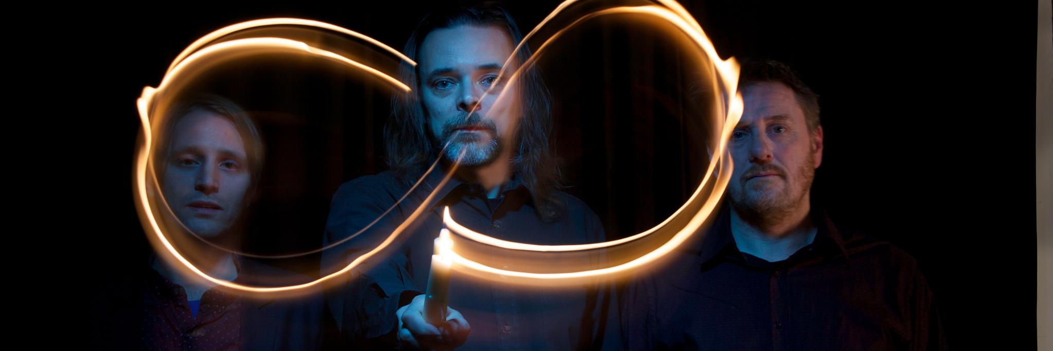 The Infinite Three banner