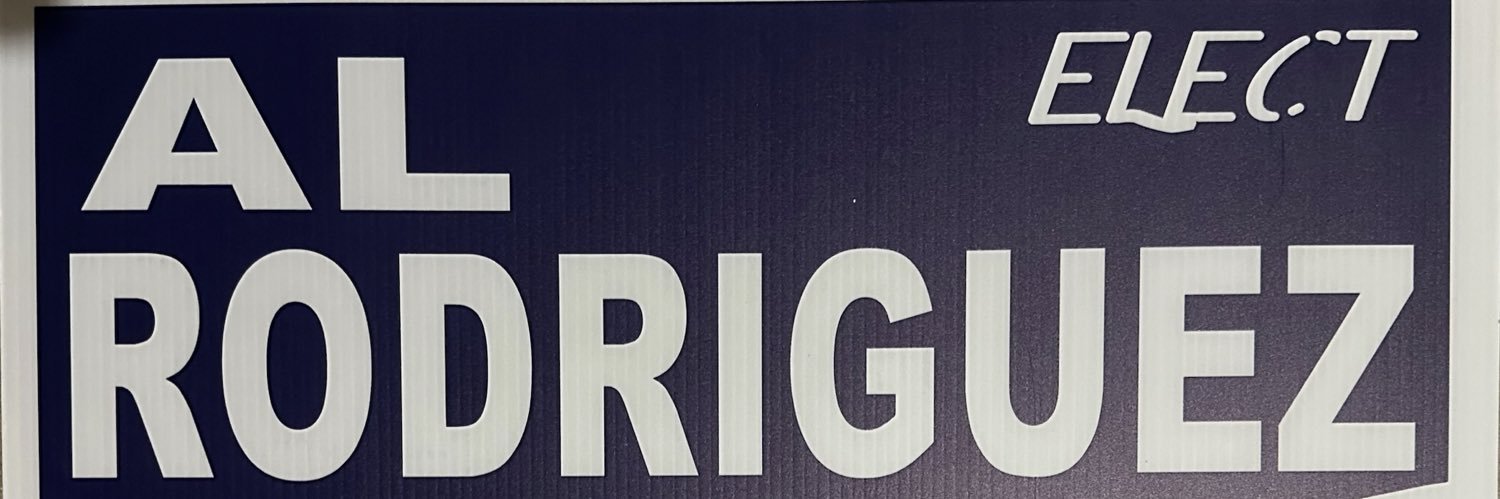 Coach Rodriguez banner