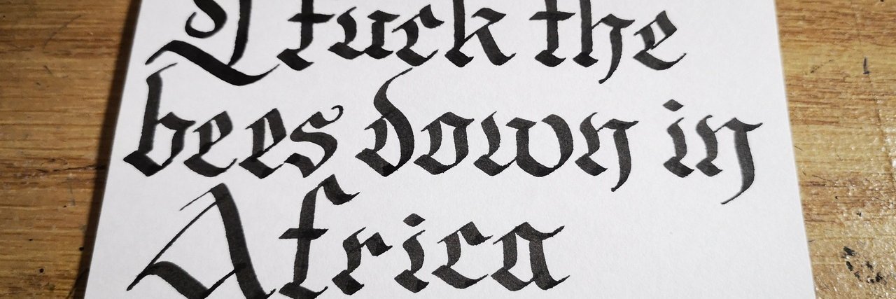 Tai @ stop the genocide banner