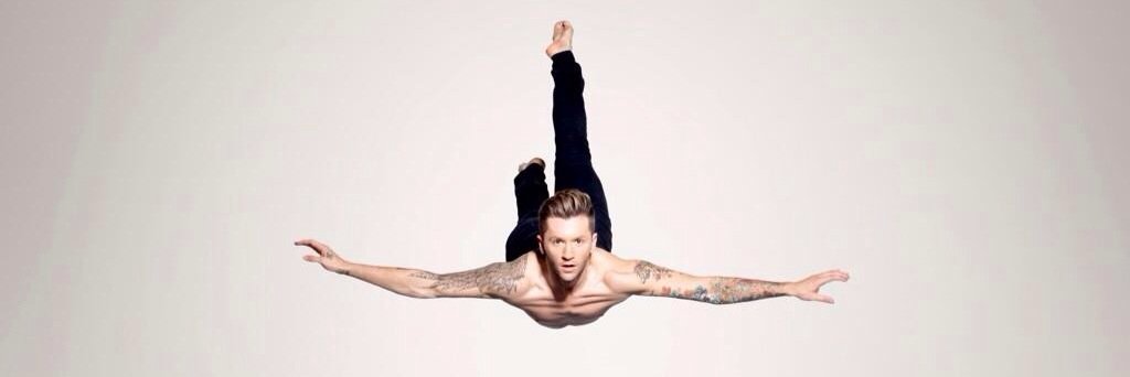 TRAVIS WALL banner