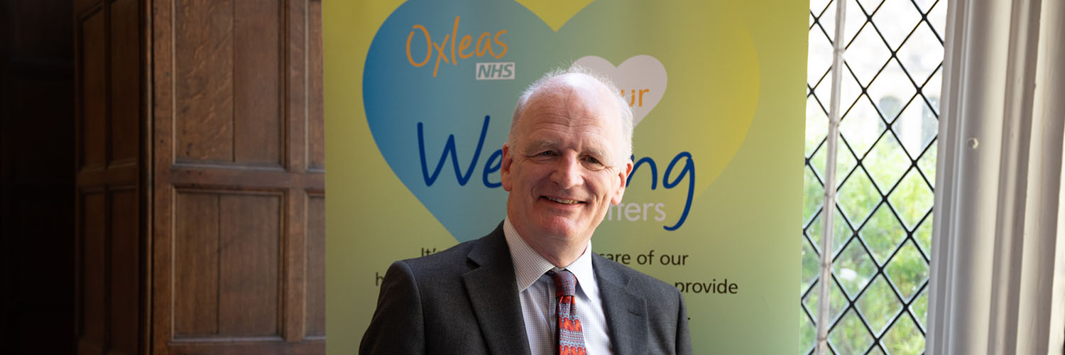 Andrew George banner