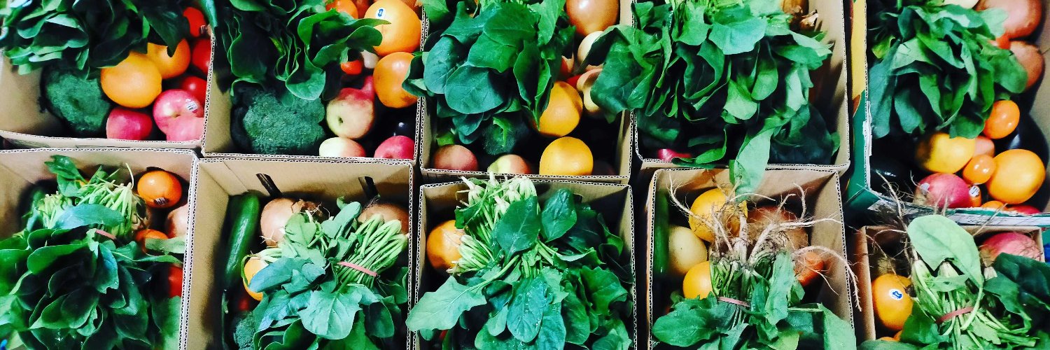 The Community Grocer banner