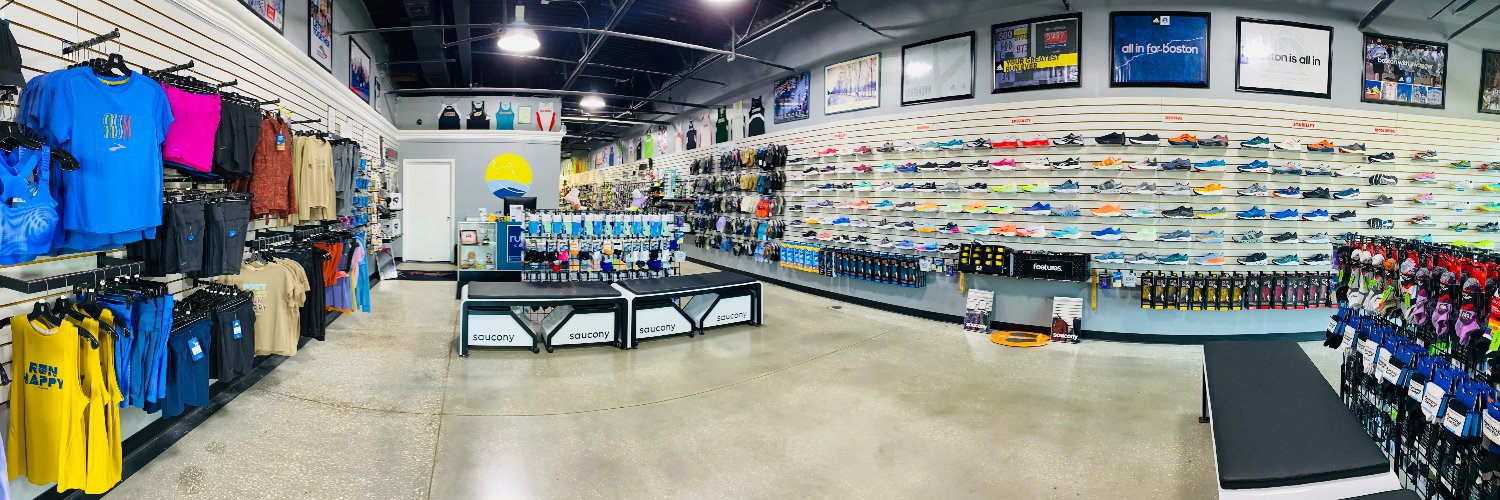 The Running Center banner