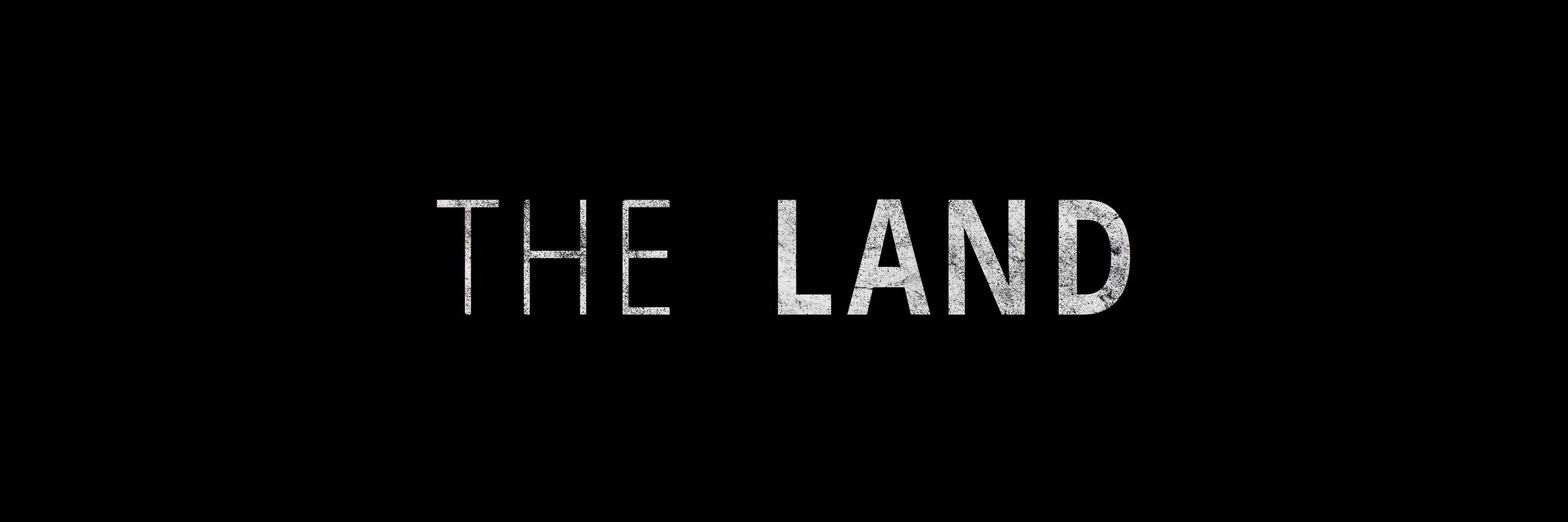 The Land banner
