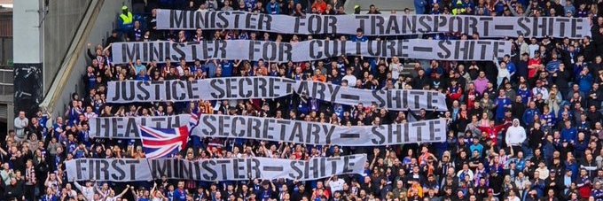 56 is a coming banner