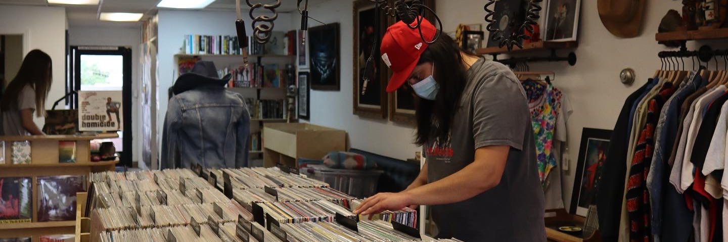 Lex with the Records banner