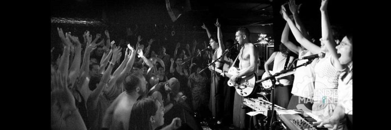 The Hidden Cameras banner