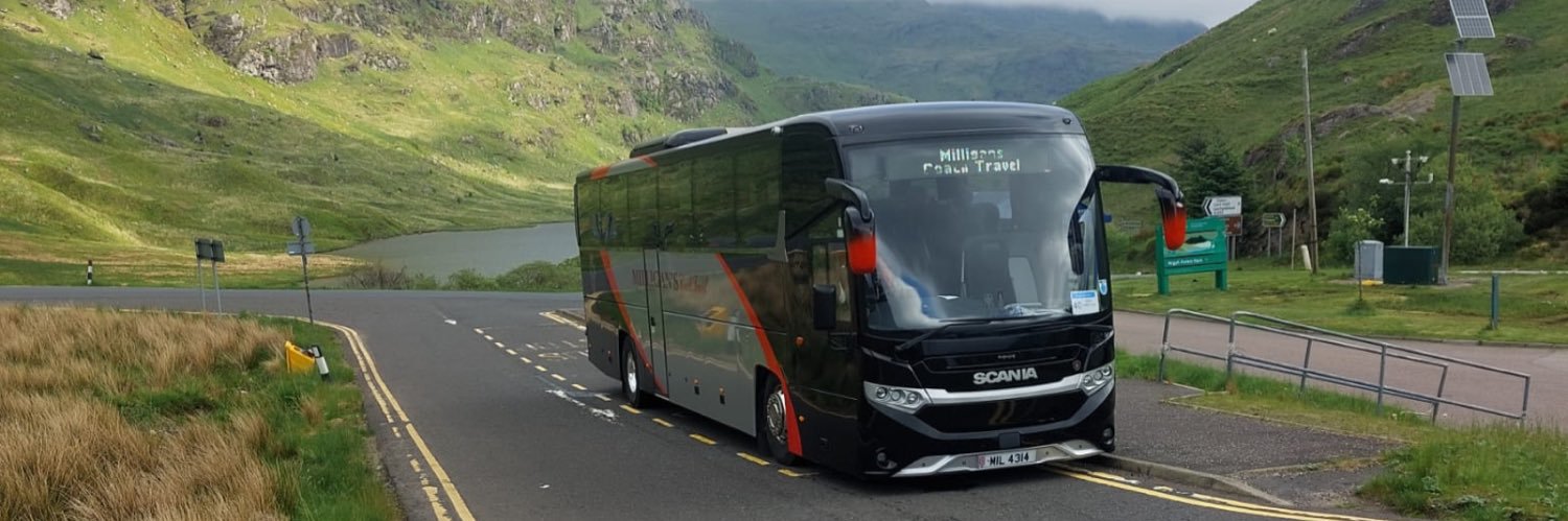 Milligan's Coach Travel banner