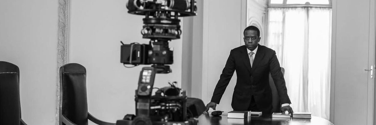 Adrian Lester banner