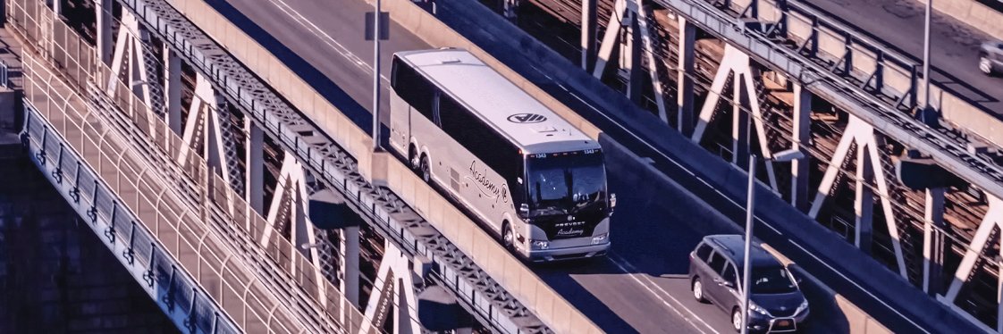 Academy Bus banner