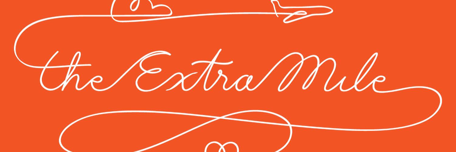 The Extra Mile banner