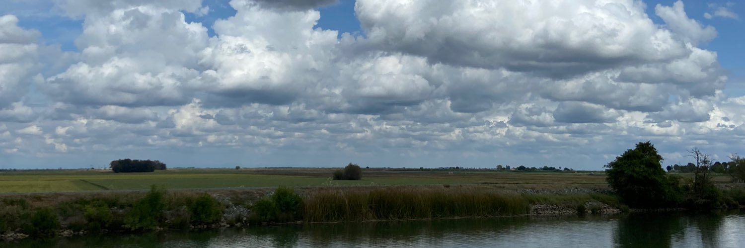 Under the Sky banner