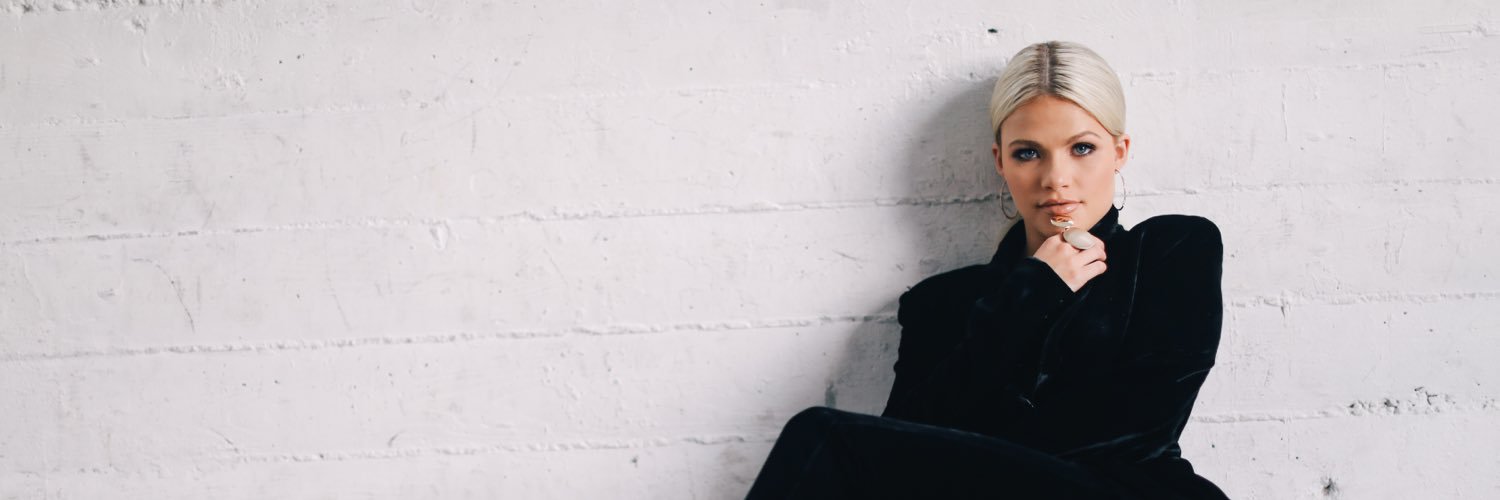 Witney Carson banner