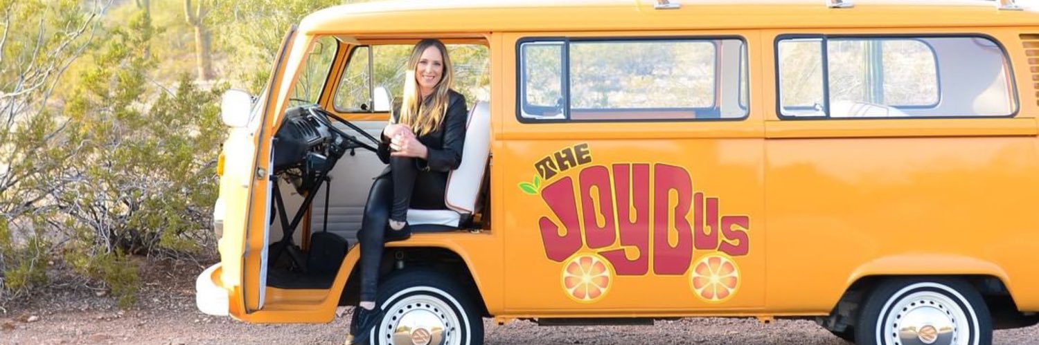 The Joy Bus banner